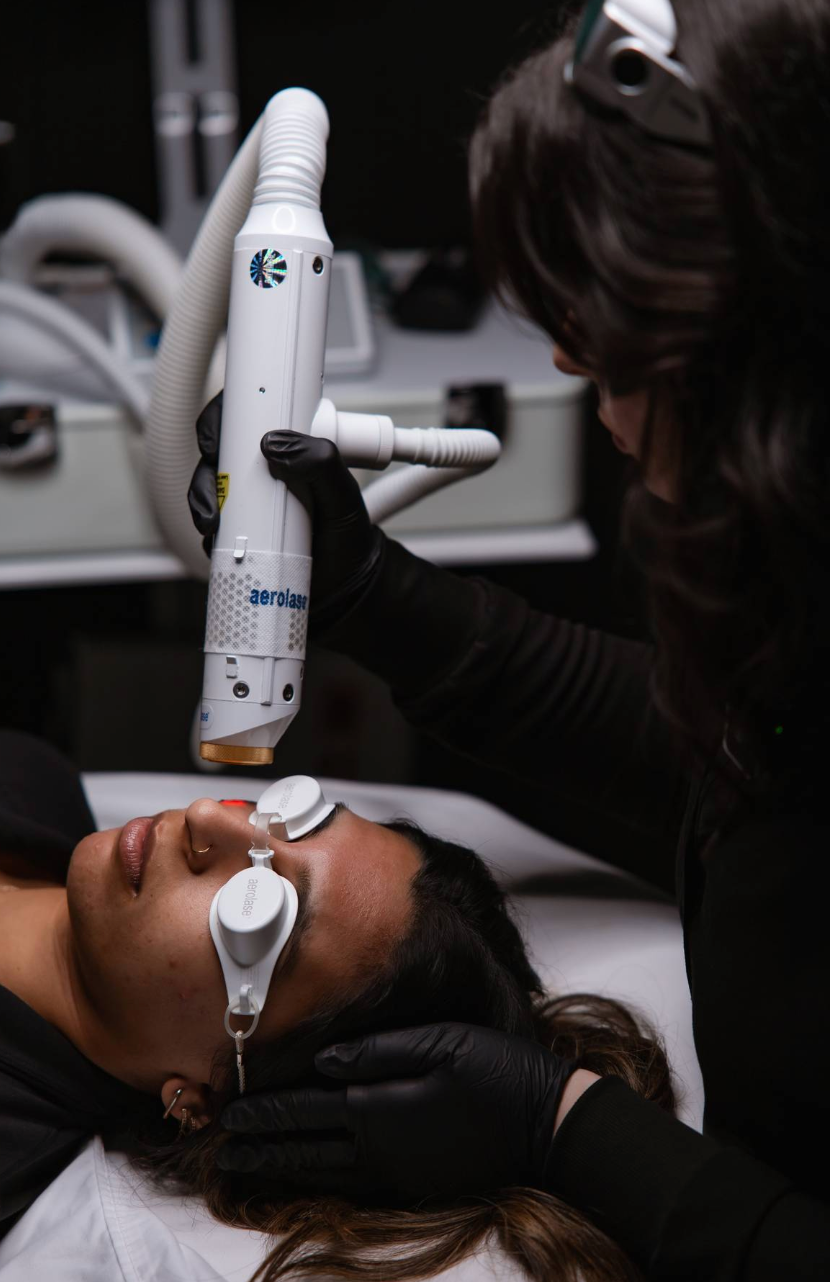 Client receiving an Aerolase Neo skin rejuvenation laser treatment at KOZA Skin Clinic, Port Coquitlam BC.