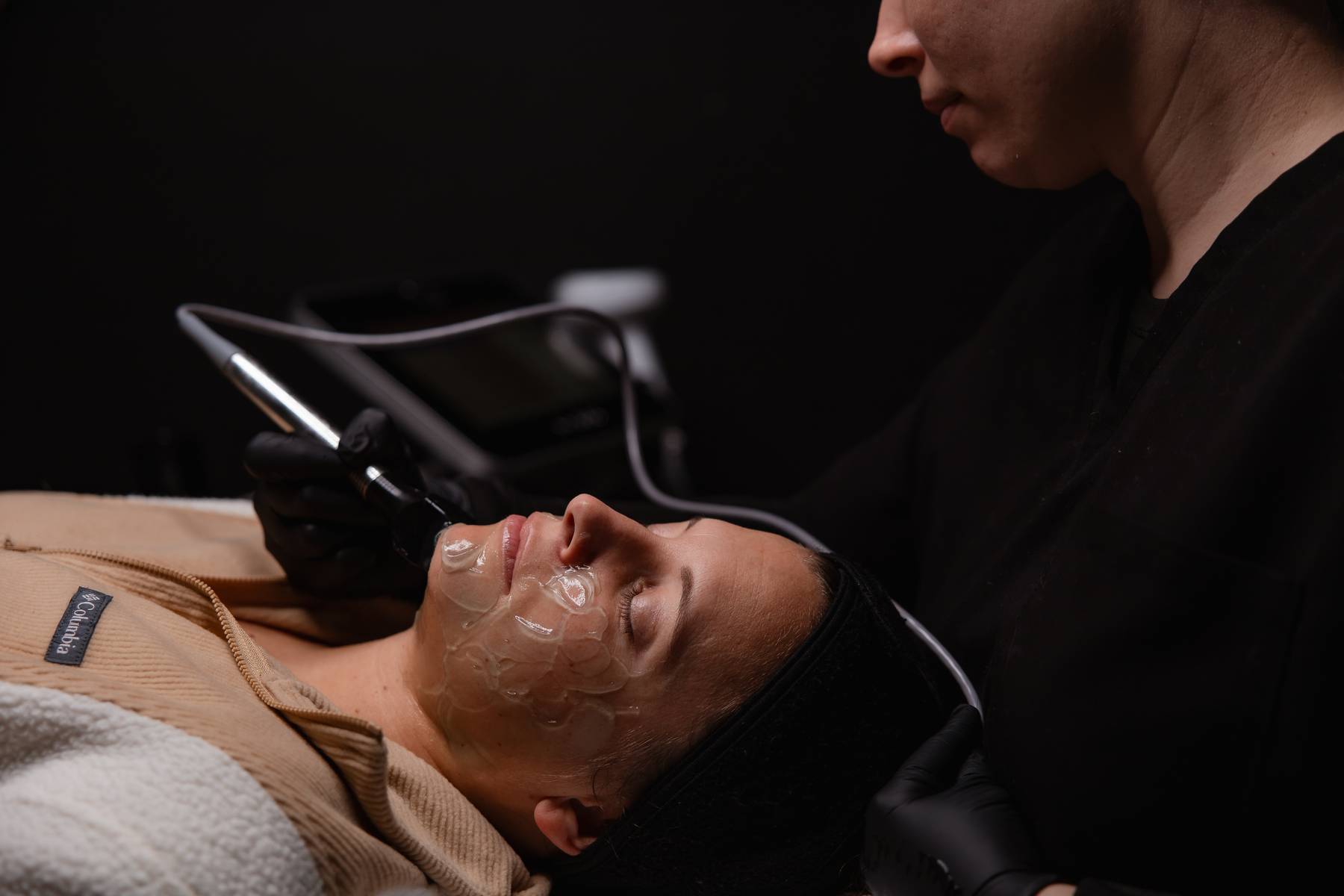 Client receiving a Forma radiofrequency skin treatment on the face at KOZA Skin Clinic, Port Coquitlam, Tri-Cities BC.