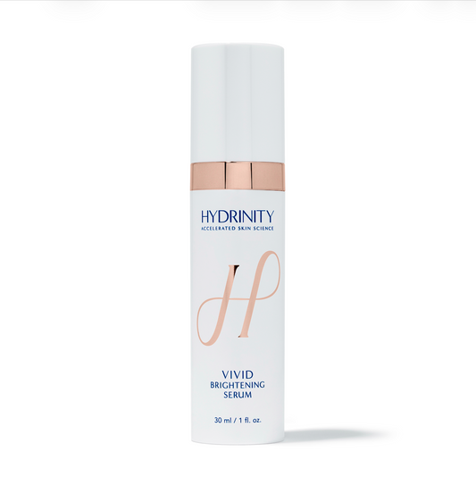 Hydrinity Vivid Brightening Serum 30 ml bottle with a rose gold collar available at KOZA Skin Clinic, Port Coquitlam, Tri-Cities BC